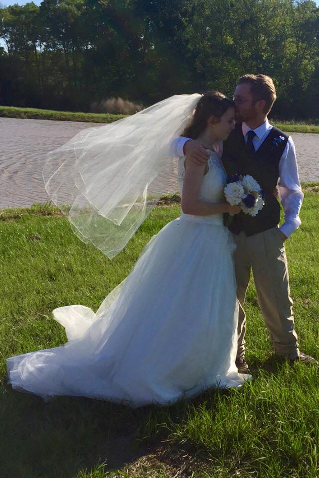 Sweet Wedding Kiss on the Forehead