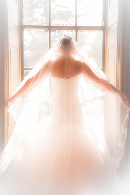 Bride Standing By Window