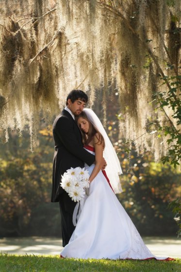 Bride and Groom Under Oaks